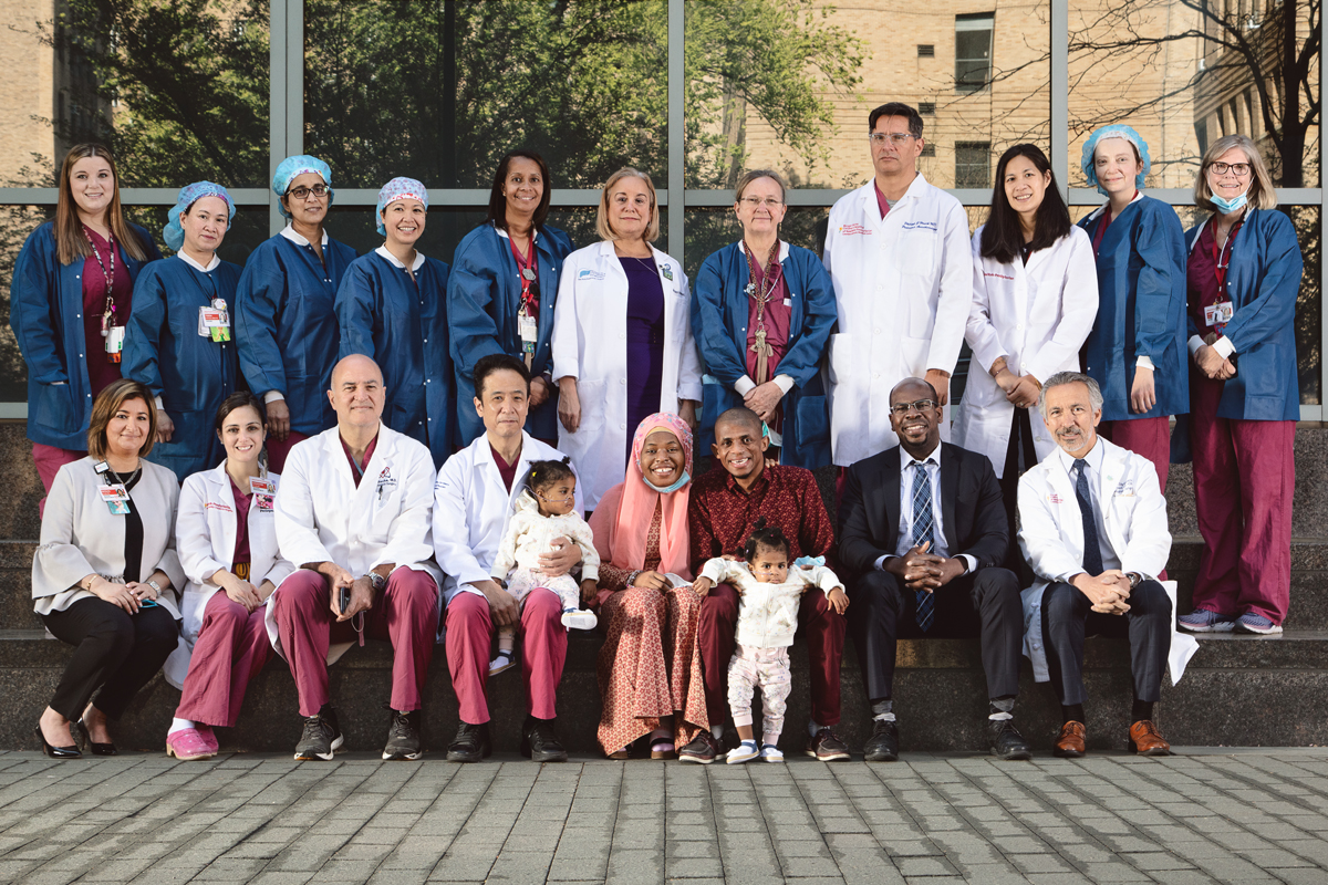 Group photo of the entire team behind the successful separation surgery of conjoined twins