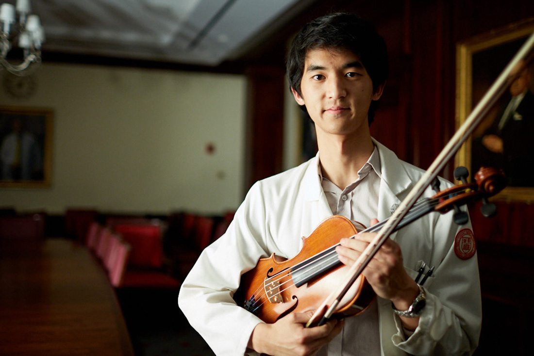 Portrait of Peter Hung with his violin