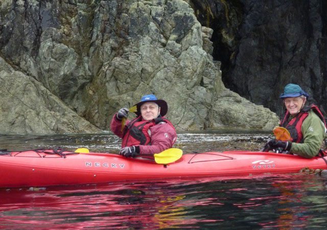 Bill and Joan McComas kayaking in Alaska