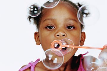 A child blowing bubbles