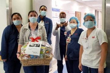 Group of NYP nurses on the front lines with a gift basket.