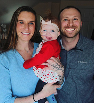 Ruby Cotter, pediatric heart transplant patient, with her parents.
