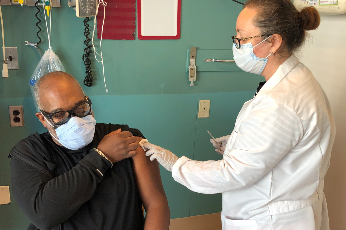 NYP staffer gets COVID-19 vaccine