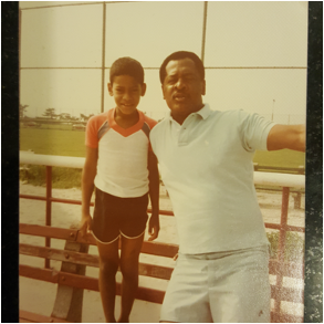Dr. Carl Crawford Jr. and his father