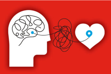 An image of a heart and brain connected by wires to show the connection between the brain and love