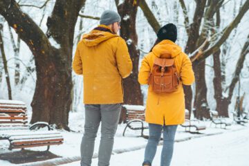 couple walking in the snow