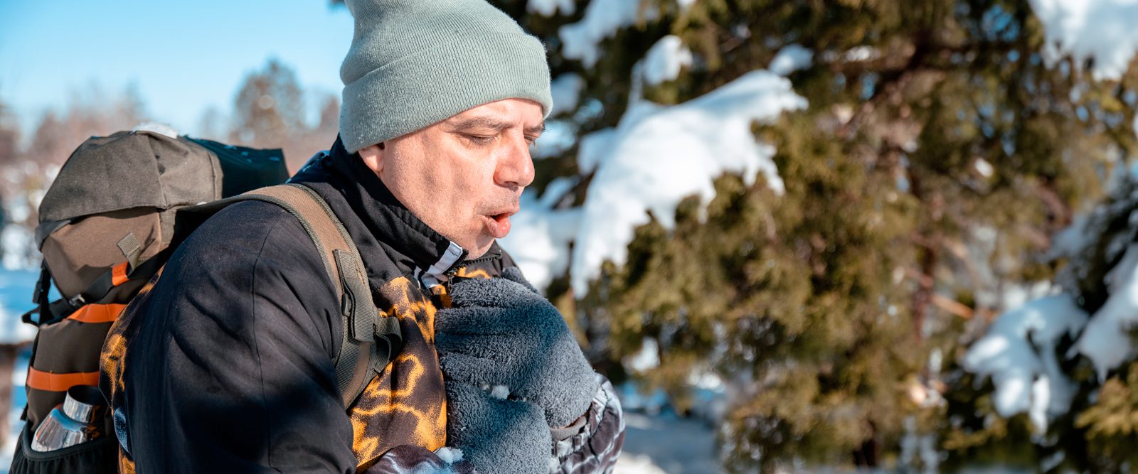 Image of a person experiencing a cardiovascular event in cold weather.