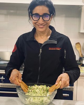 A woman making a salad
