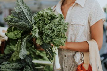 Woman holding kale
