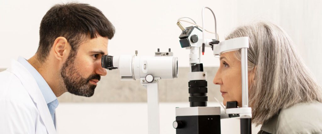 patient and ophthalmologist during an eye exam