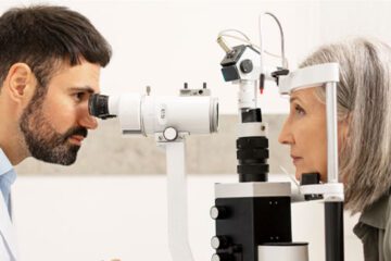 patient and ophthalmologist during an eye exam