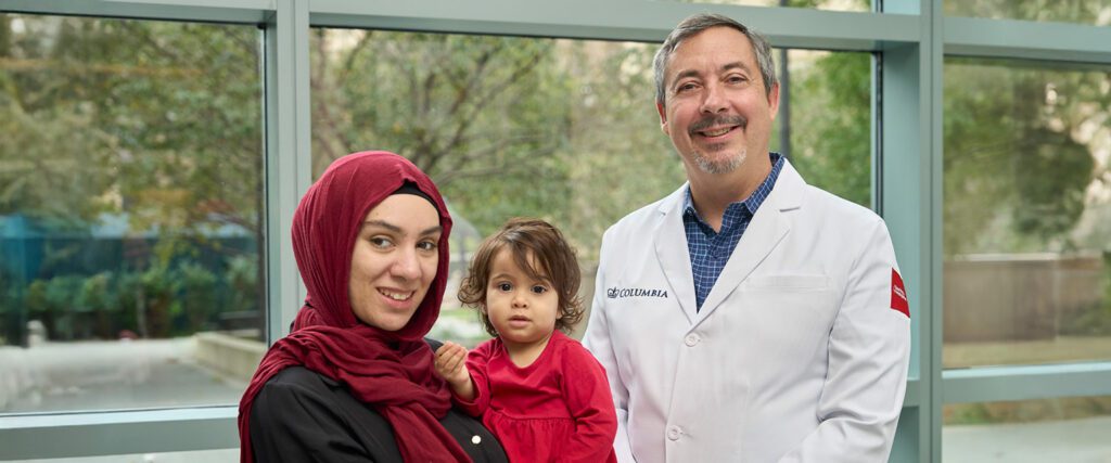Portrait of ophthalmologist Dr. Brian Marr with patients.