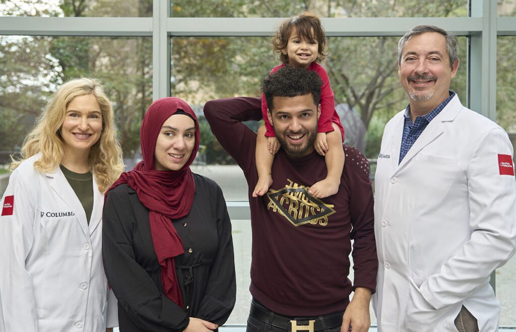 Portrait of ophthalmologists Dr. Brian Marr and Dr. Lauren Yeager with patients