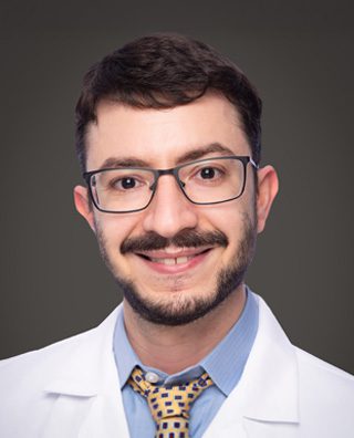 Portrait of Dr. Adam Blumenberg.