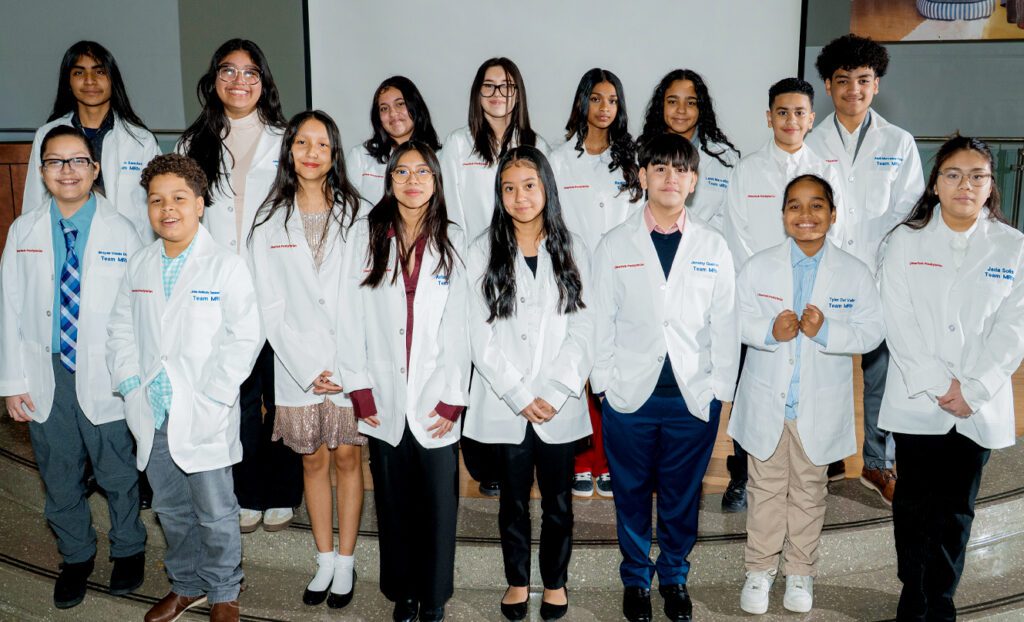 NewYork-Presbyterian Lang Youth program graduates at white coat ceremony.