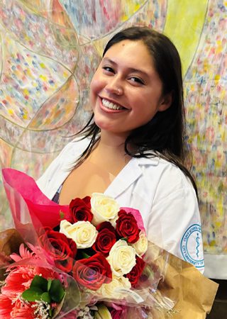 Portrait of NewYork-Presbyterian Lang Youth program graduate Maya Gomez.