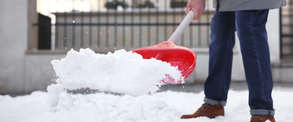 man shoveling snow
