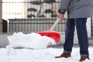 man shoveling snow