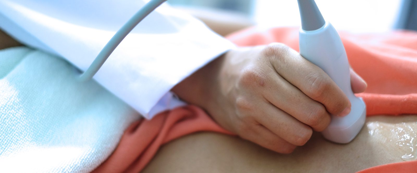 A doctor performs an ultrasound of the heart, which can measure ejection fraction